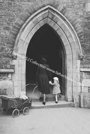 MARY CUNNINGHAM ENTERING CHURCH